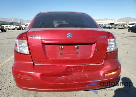 2012 Suzuki Sx4 Le z USA, uszkodzony, nr VIN JS2YC5A38C6302398